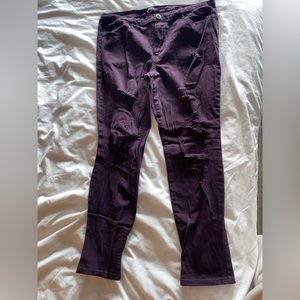 Purple distressed skinny jeans
